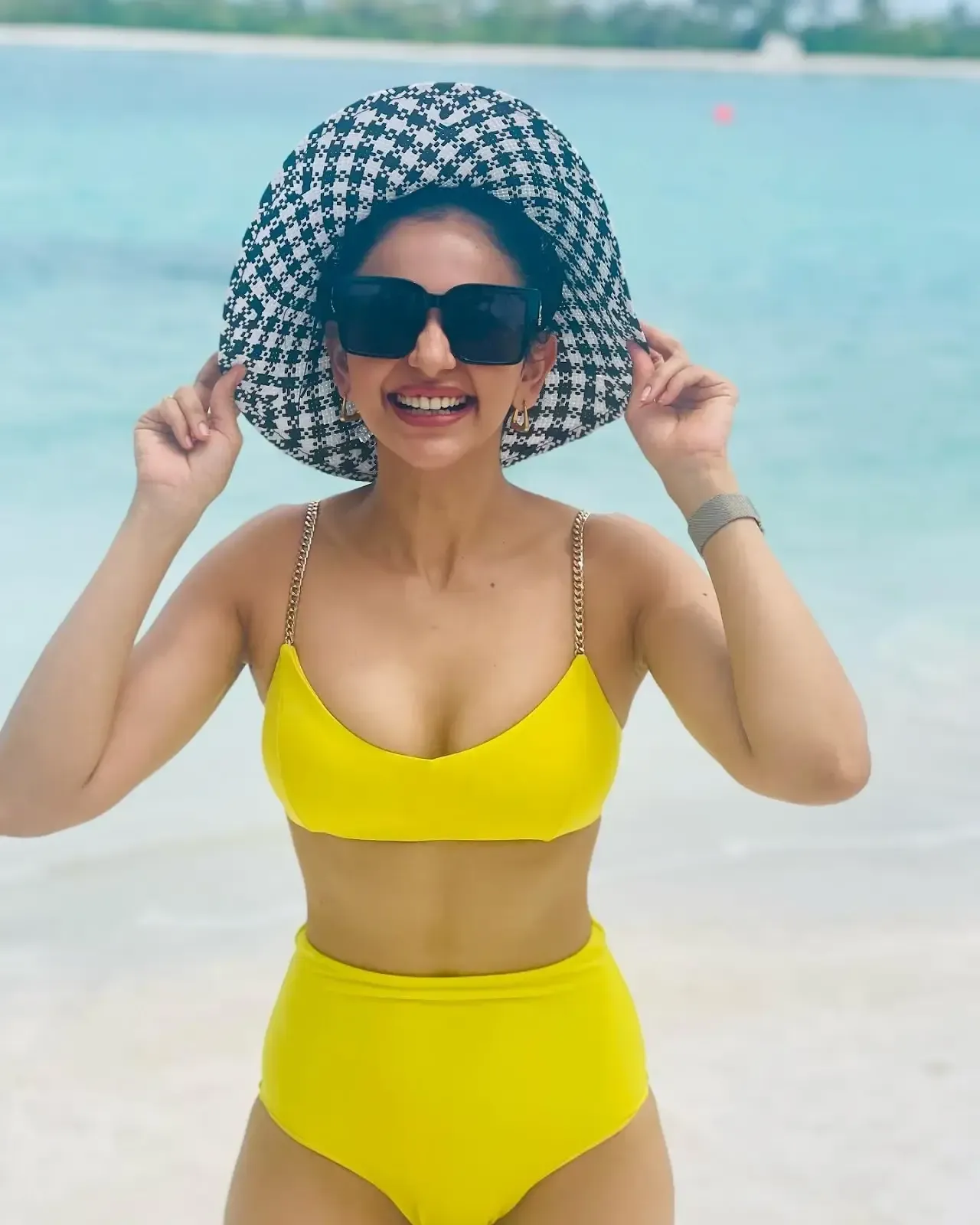 Indian Girl Rakul Preet Singh Hot Photoshoot in Beach in Yellow Bikini